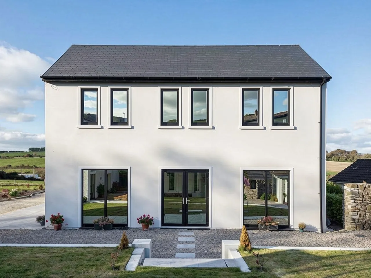 A rendered two-storey home before and after window film